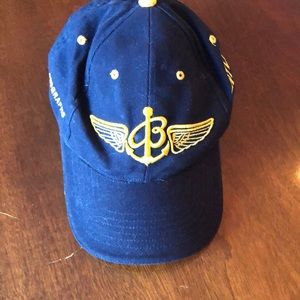 Breitling blue baseball style cap.  Navy Blue with gold logo